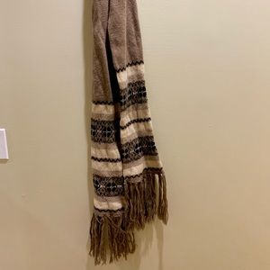 Extra long, thick, warm and comfortable wool scarf.